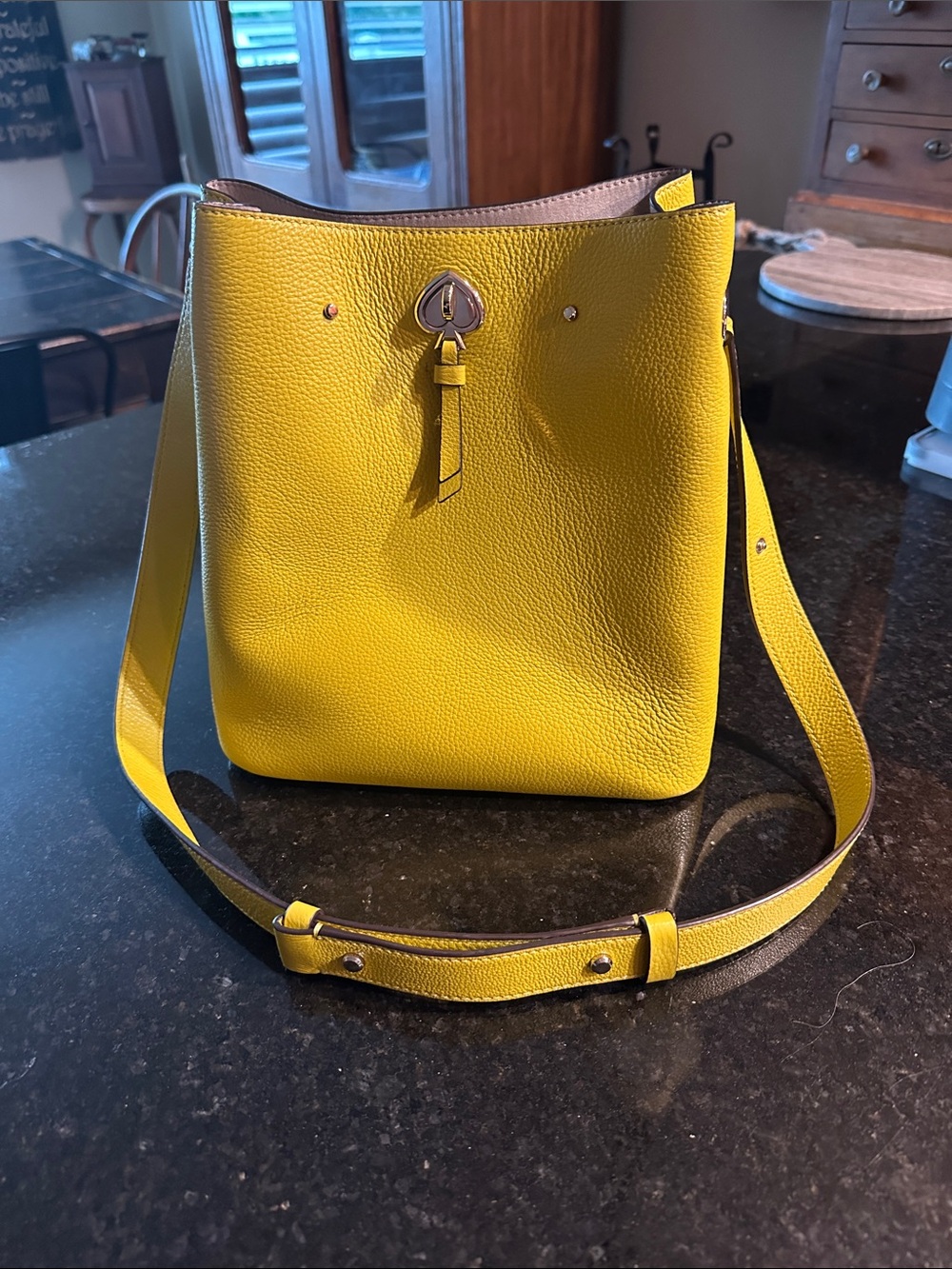 Kate Spade yellow green leather bucket bag